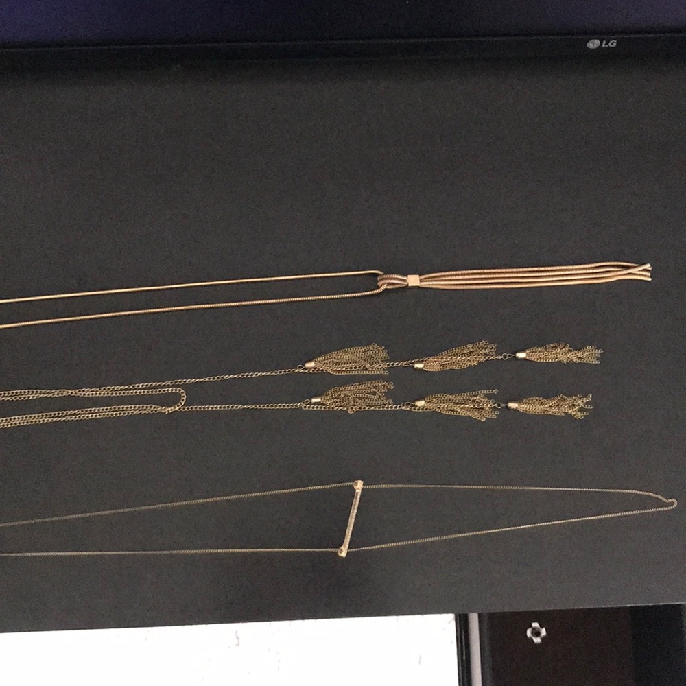 Gold necklaces.
